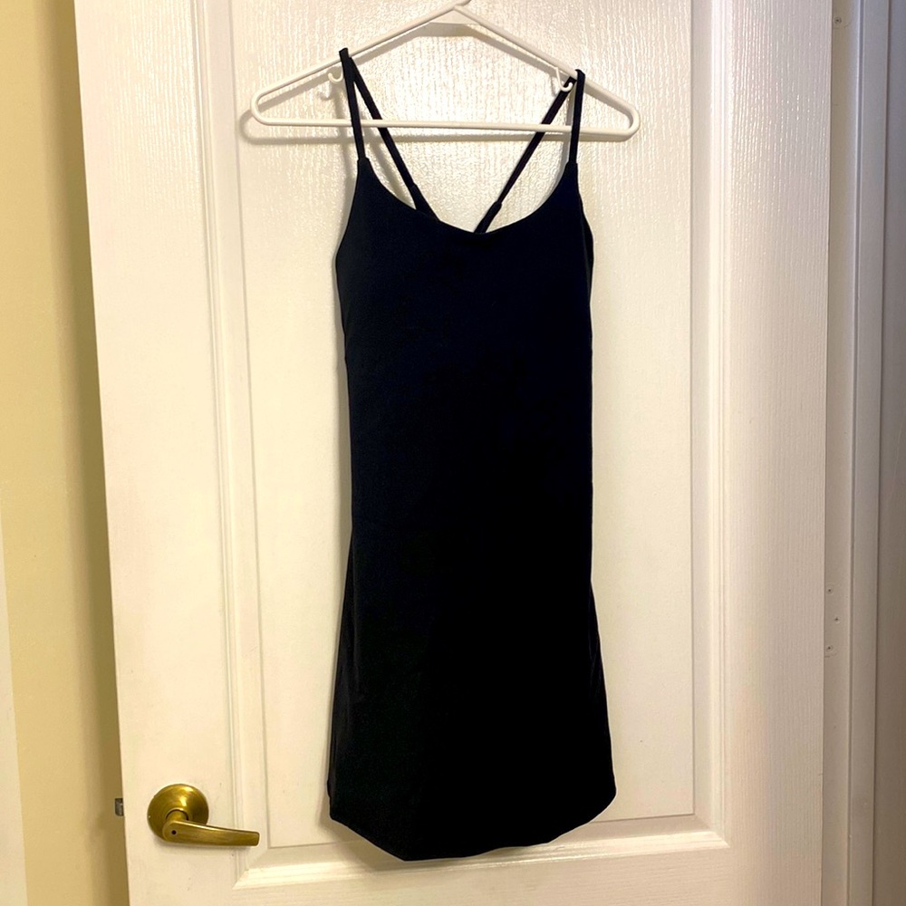 Sports dress with shorts under used once.